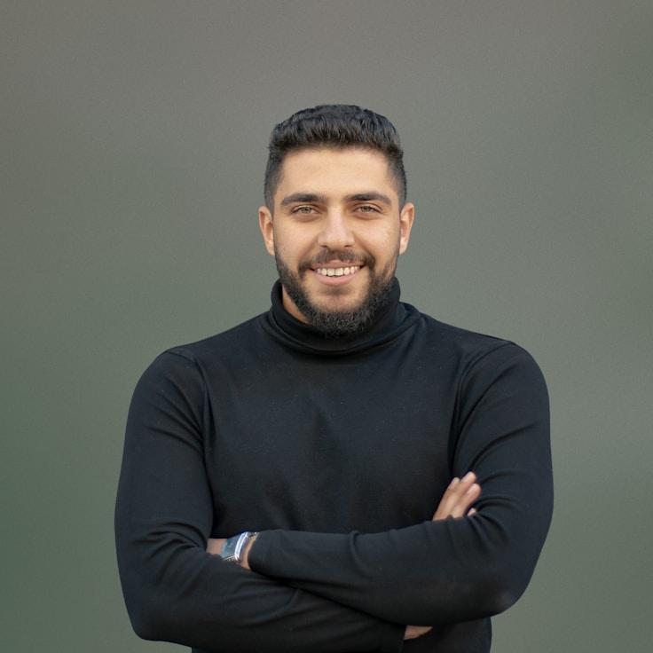 Kaveri Mehta, Lead Design Curator at Marble Glade Fern, reviewing corporate floral arrangements